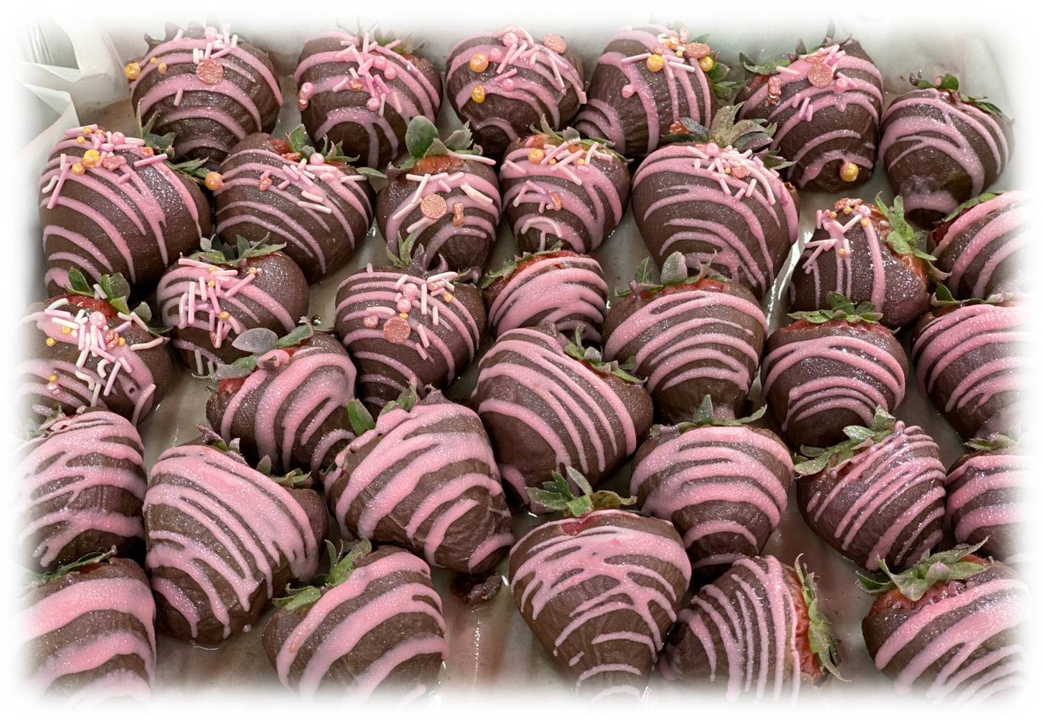 pink drizzle belgian choc strawberries.jpg